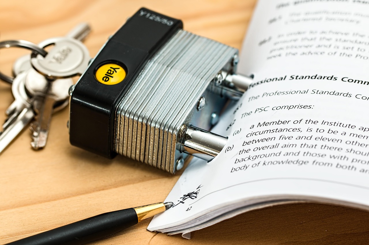 Official legal summons and complaint papers on a wooden desk
