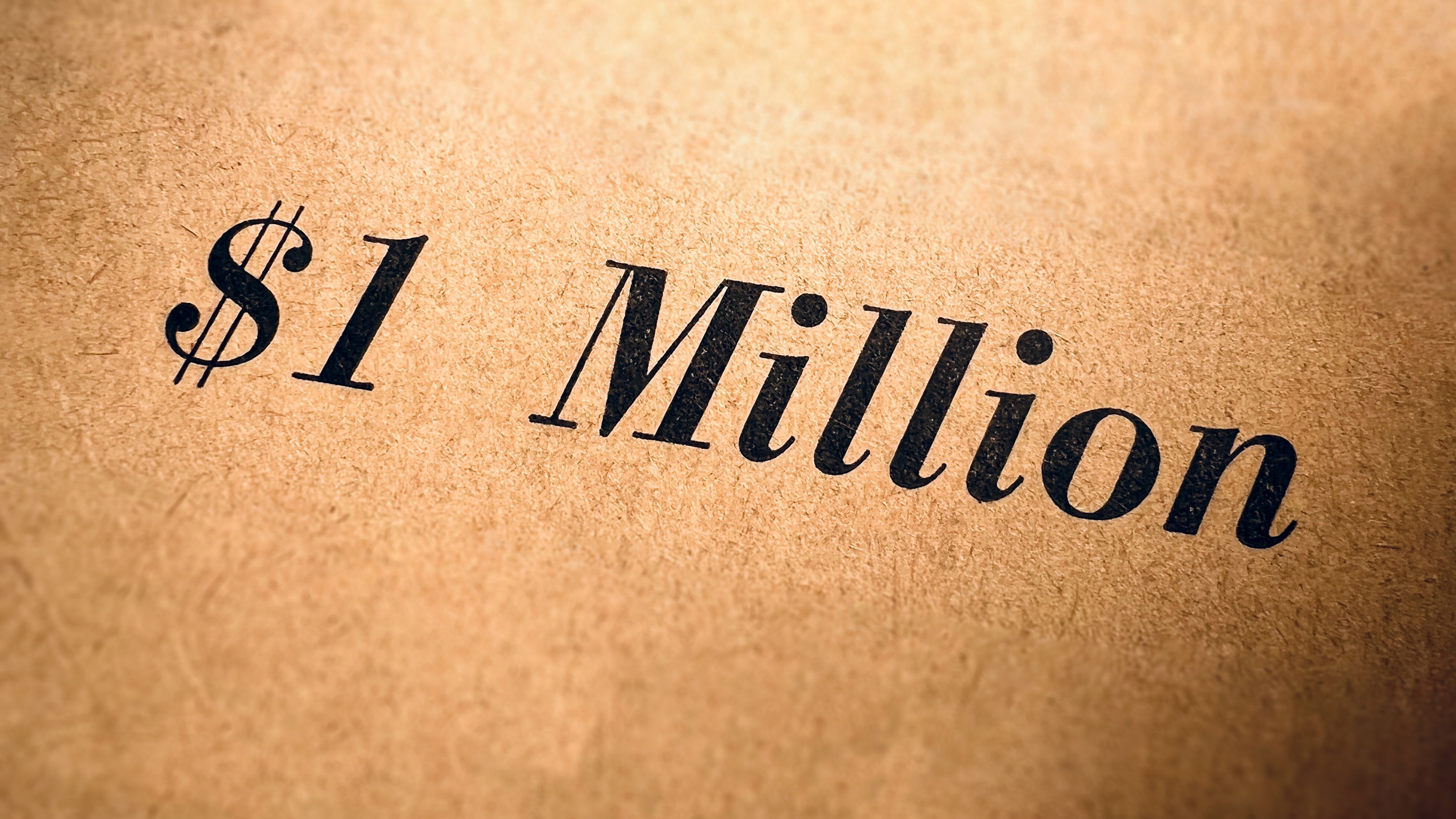 A decorative document with the words $1 million written on it.