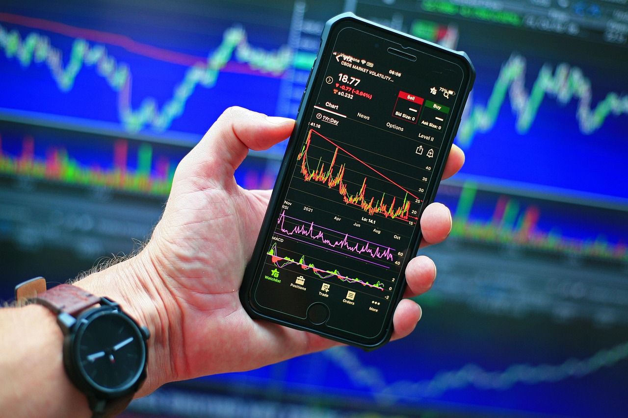 Electronic financial chart showing market volatility and fluctuating stock prices.