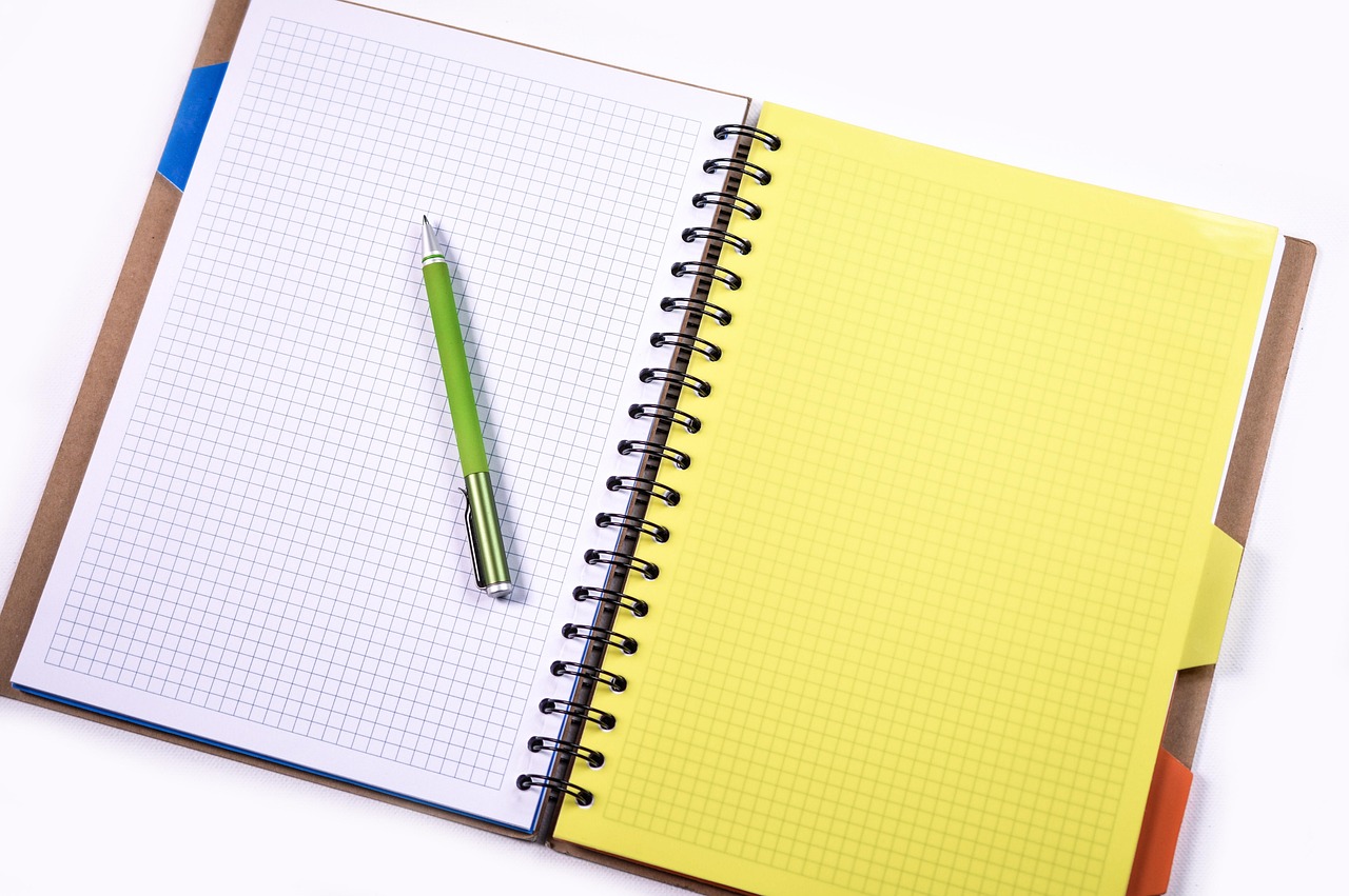 A hand checking off items on a professional checklist for penalty abatement requirements.