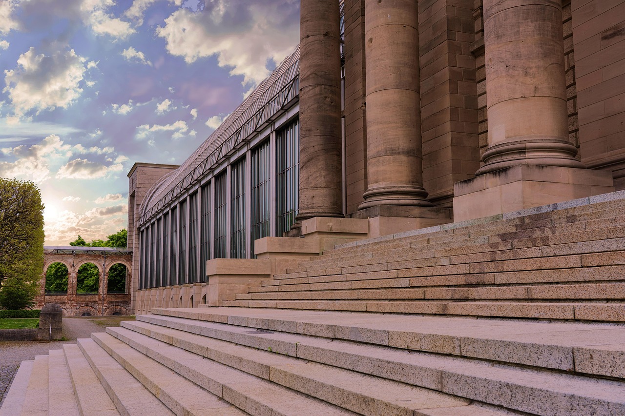 Closer view of classical government building pillars representing institutional authority and regulation.