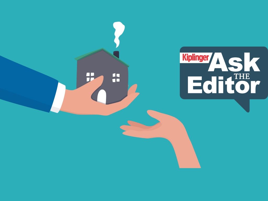 Graphic text stating 'Ask the Tax Editor' regarding residential rental property questions.