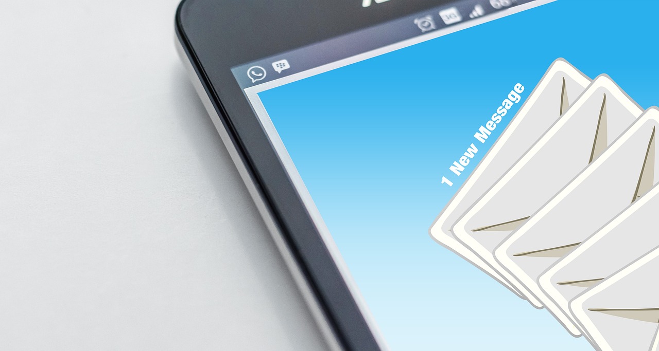 An envelope being prepared for certified mail delivery with a postage stamp.