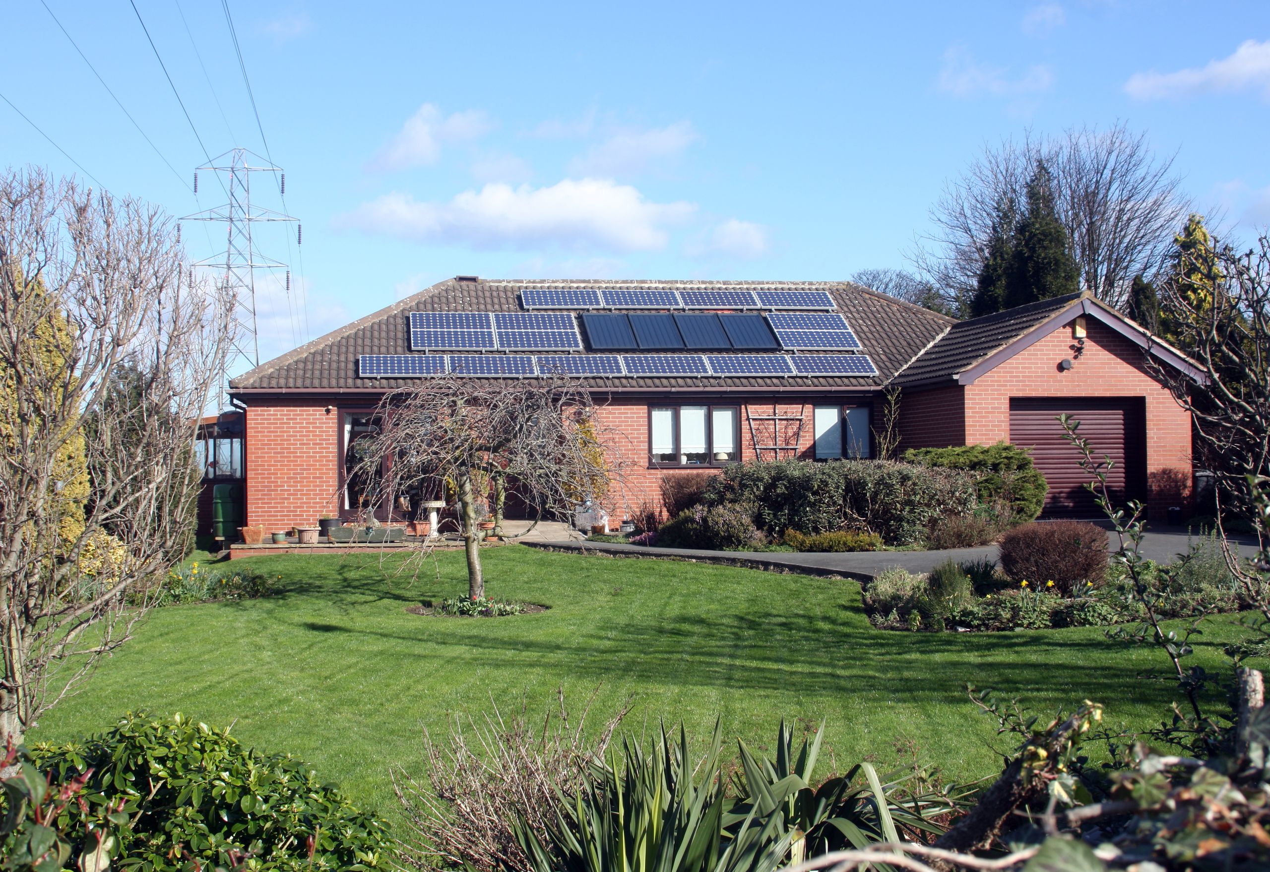 Text overlay reading I Bought a House With Solar Panels. What Do I Do With Them Now?
