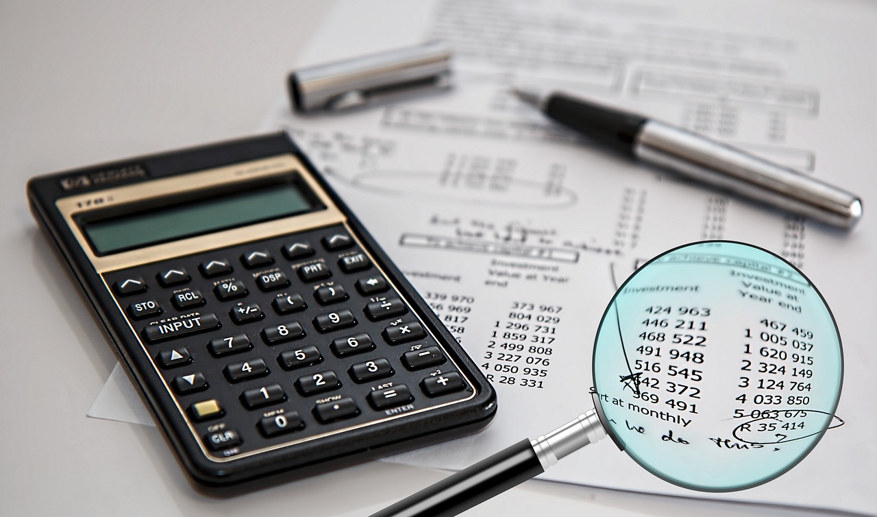 A magnifying glass over a financial document highlighting the details of a tax notice.