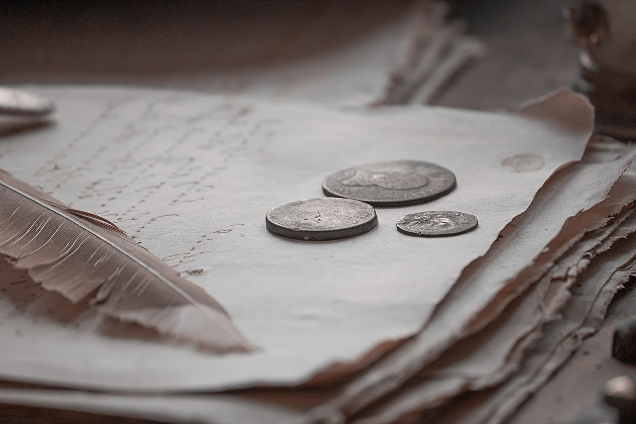 A passport placed next to professional business documents and a pen on a clean office desk.
