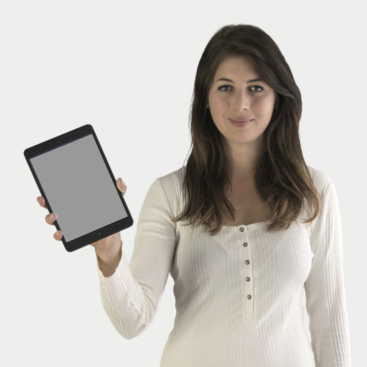 A person checking a digital tablet for transaction details.