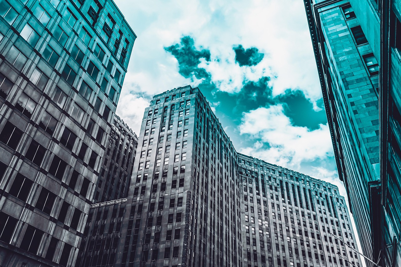 A modern glass bank building representing institutional security and regulatory compliance.