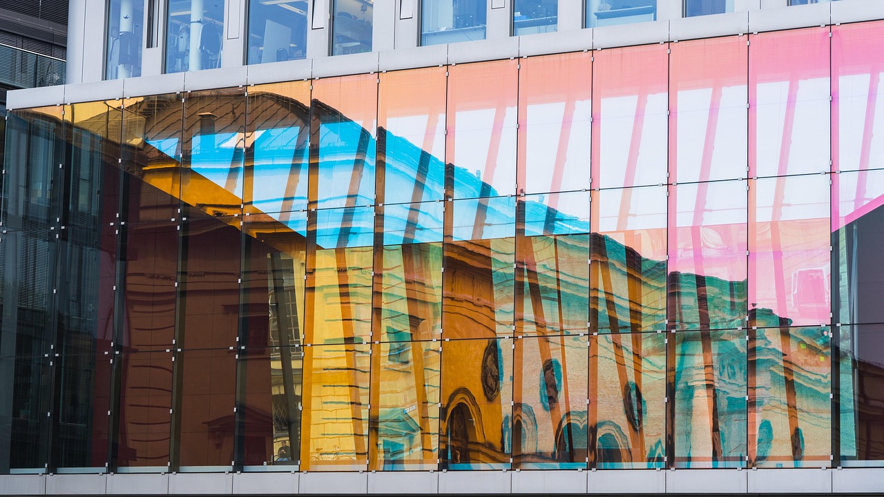 A modern glass office building representing a physical US business address.
