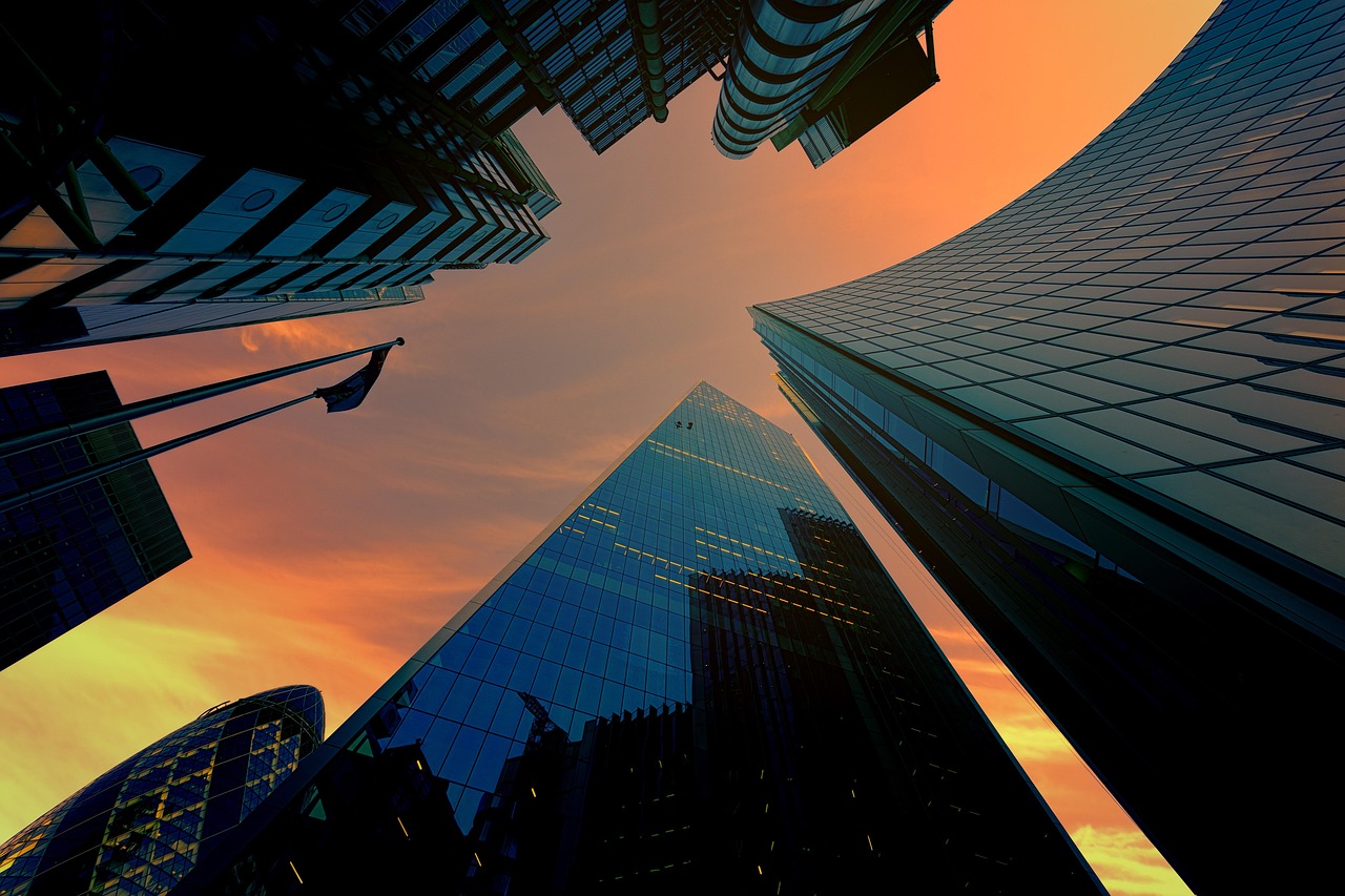 Modern city skyline with illuminated glass buildings in a luxury district