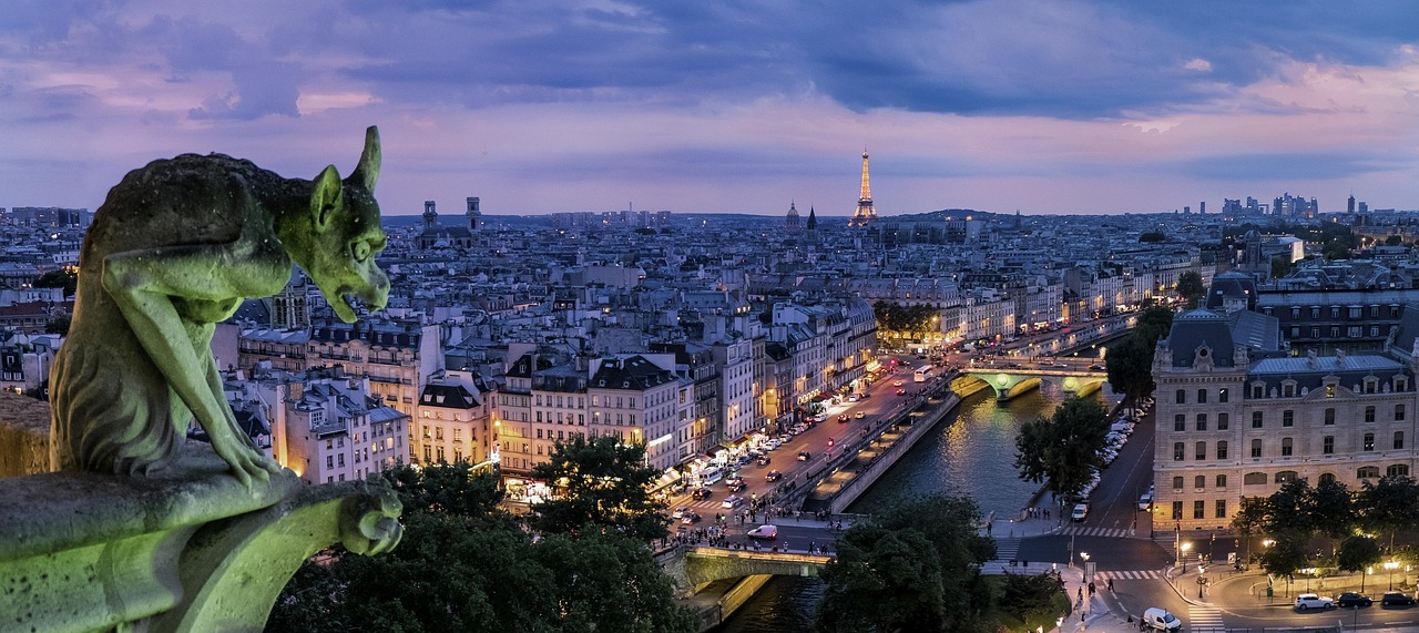 A city skyline at night, representing late-hour digital processing cut-offs.