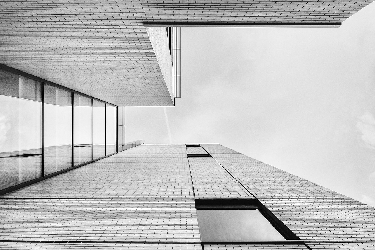 A modern multi-story residential building representing rental property