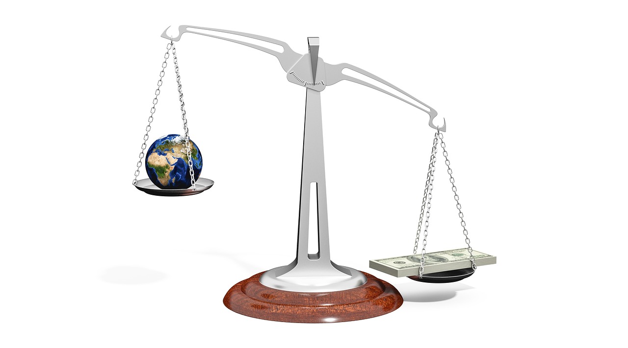 A balanced scale representing the comparison between a CLI and a new card application.
