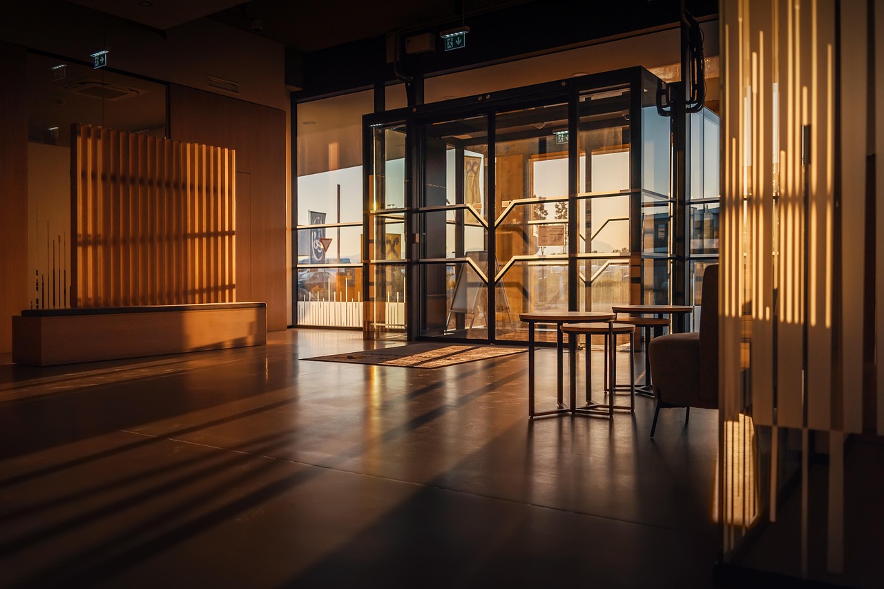A modern, professional bank lobby with clean glass architecture.